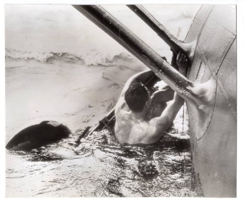 1941 ground crew install wheel - 1941,
