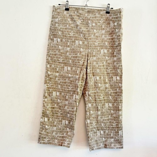 Beige and white patterned - and,