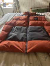 Plurimus Orange Gilet With