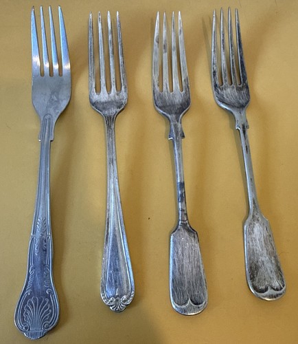 Four antique forks - four,