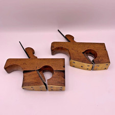 Pair tailed handle - of,