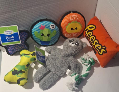 Seven dog toys - two, tags