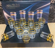 set of 12 Moroccan-style gold-rimmed drinking or tea glasses.