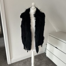 Black Rabbit and Racoon Fur