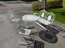 Table and chairs and bench