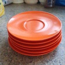 6 vintage Melaware orange saucers