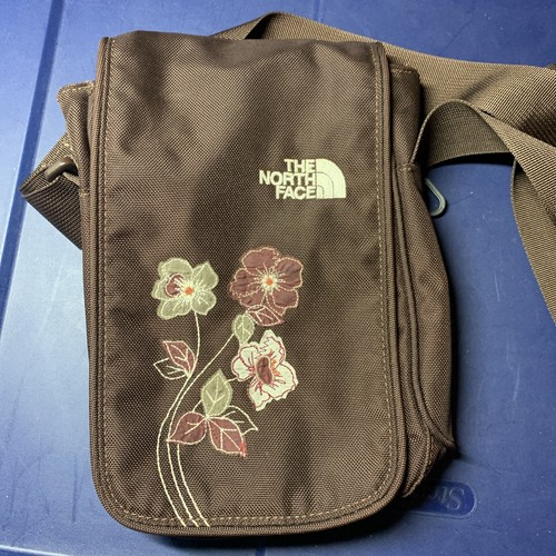 North face brown flower - face,