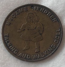 MADAME HENDREN TALKING AND WALKING DOLL GOOD LUCK MEDAL