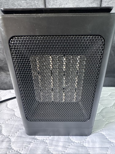 Electric fan heater with - heater, wall