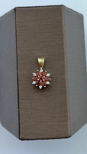 Garnet and diamond 9ct gold - and,