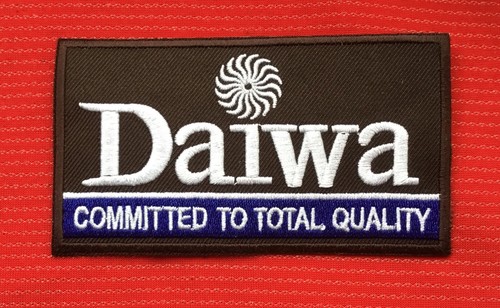 Brown daiwa fishing badge iron - fishing,