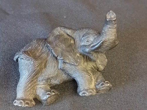Resin reclining elephant - resin'reclining, elephant'