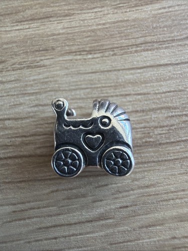 Genuine retired pandora baby - retired,