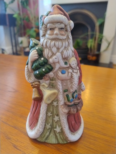 Santa claus holding christmas - santa,