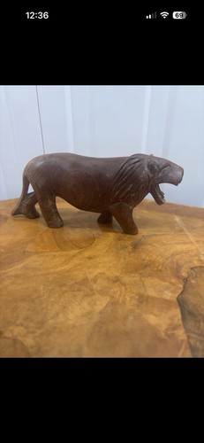 Handcrafted wooden male lion - male,