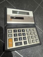 Vintage CASIO SL-100W Solar Powered Wallet Calculator - Working Order