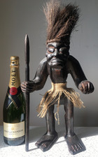 Large hand carved tribal - large,
