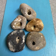 Four large  Natural Hag Stones