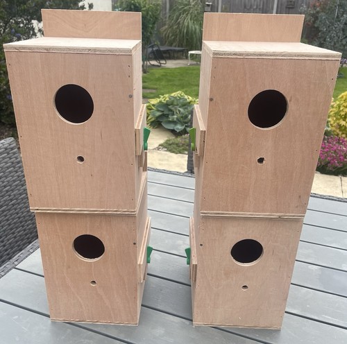 Four parakeet nestboxes - nestboxes.,
