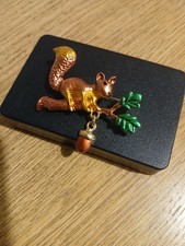 Squirrel With Dangling Acorn