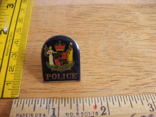 1980s pin tie tac - new, zealand
