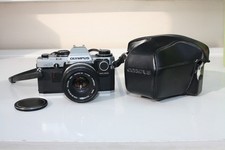 OLYMPUS OM10 35mm SLR FILM CAMERA WITH ZUIKO 50mm F1.8 LENS PLEASE READ.