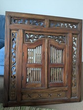 curved wood wall mirror with shutter panel doors