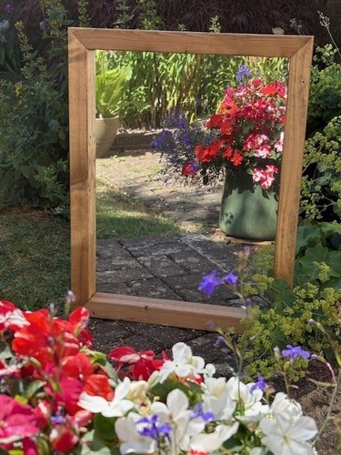 Wooden framed garden mirror