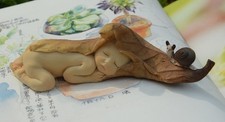 Leaf Baby with Snail Statue