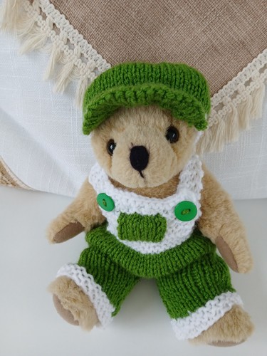 Hand knitted teddy bear - hand,