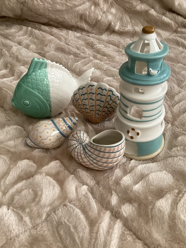 Next lighthouse and seashells - next,
