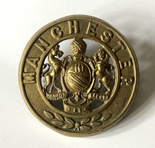 British Army Manchester Regiment blue cloth helmet plate centre