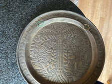 Large Damage. Brass Wall