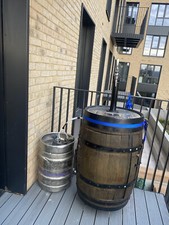 Home reclaimed Modern Whisky Barrel draft beer dispenser.