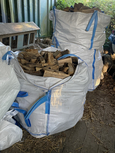 Seasoned hardwood logs ready