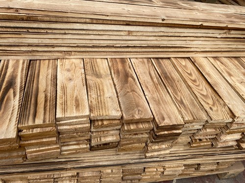 New scorched wood cladding - new,