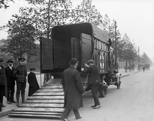 1916 men placing ramp new - placing,