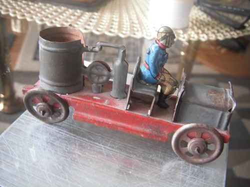 Vintage tinplate penny toy - tinplate,
