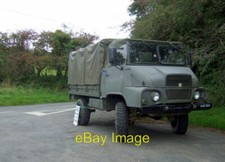 Photo 6x4 Old army truck at Llanychaer Parked at the crossroads to advert c2010