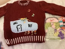 hand knitted jumper with finger and hand puppets