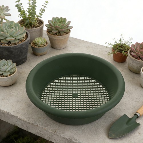 Green plastic garden - plastic, sieve