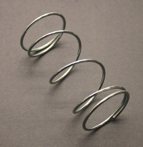 Centering spring for - for, ammco