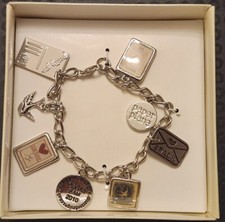 Disaster Designs Charm