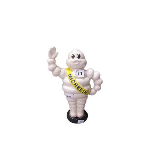 Cast iron michelin man money - michelin,