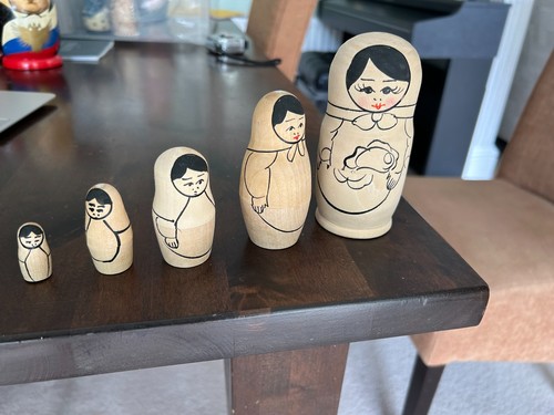 Wooden russian doll set with - 5,