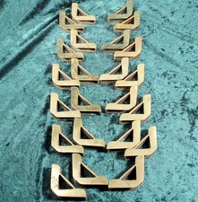 ANTIQUE SET 23 BRASS