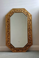Large 1930s brass shell patterned mirror