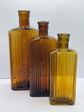 3 old amber glass poison bottles, not to be taken. Halloween
