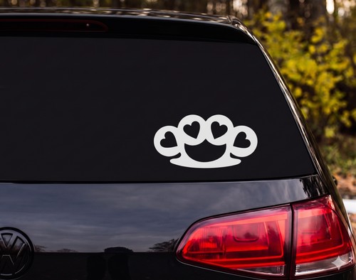 Brass knuckles heart holes - heart,