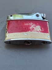 Vintage penguin pocket lighter with Players Gold Leaf branding